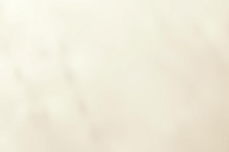 Close-up of high-quality paper texture with a subtle watermark